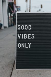 a sign on a sidewalk