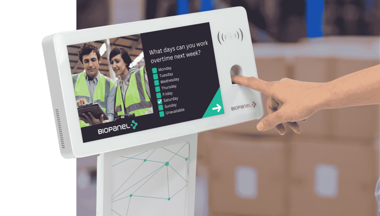 a hand holding a touch screen device